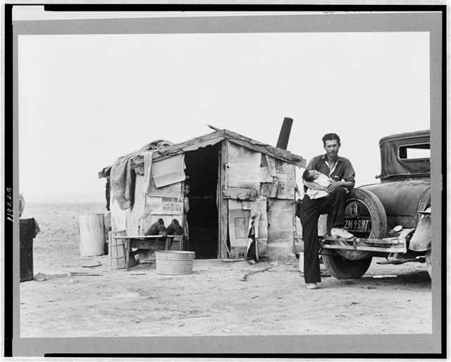 Lange, Dorothea : Migratory Mexican field worker's home on the edge of a frozen pea field. Imperial Valley, California 